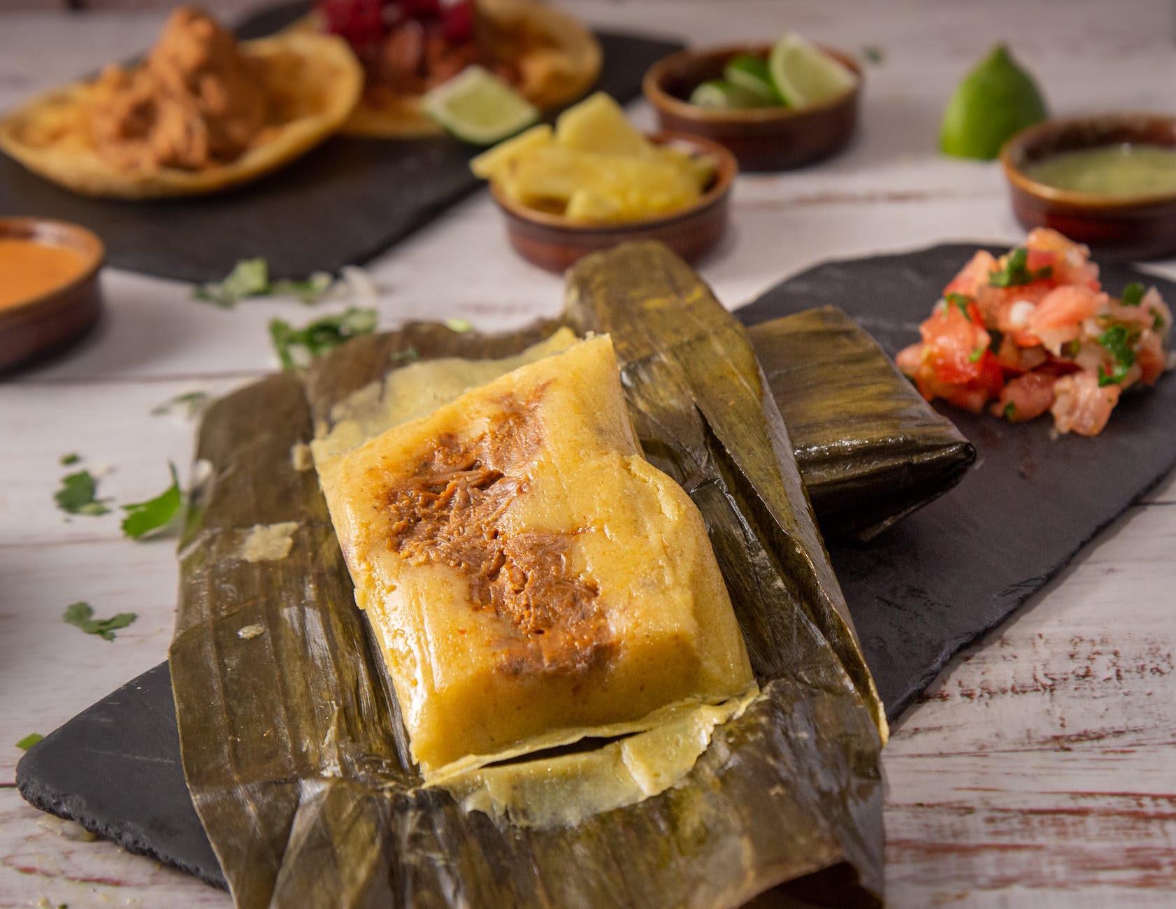 a delicious tamale on banana leaf