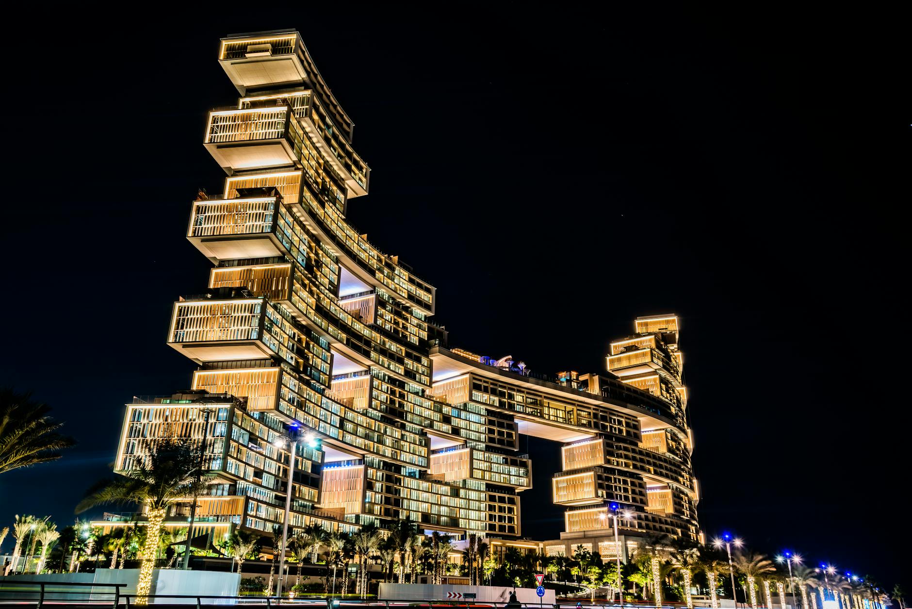 facade of an illuminated atlantis the royal hotel in dubai uae