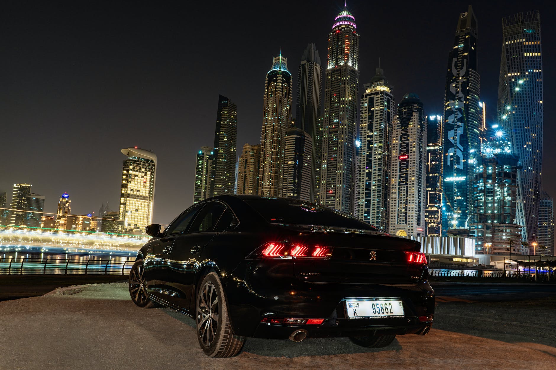 black vehicle parked near buildings